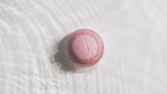 Video preview of the AALIS Etheria Bath Bomb Passion Veil dissolving in water.